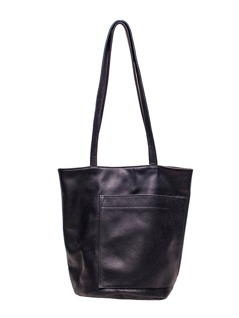 erin templeton bucket bag in black leather, propped hanging with handle up against white background.