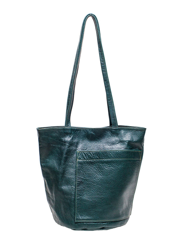 erin templeton bucket bag in forest leather, propped hanging with handle up against white background.